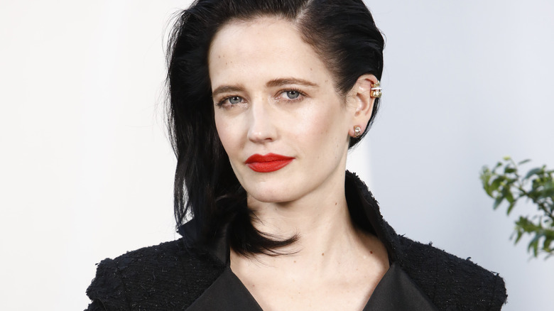 Eva Green posing in red lipstick