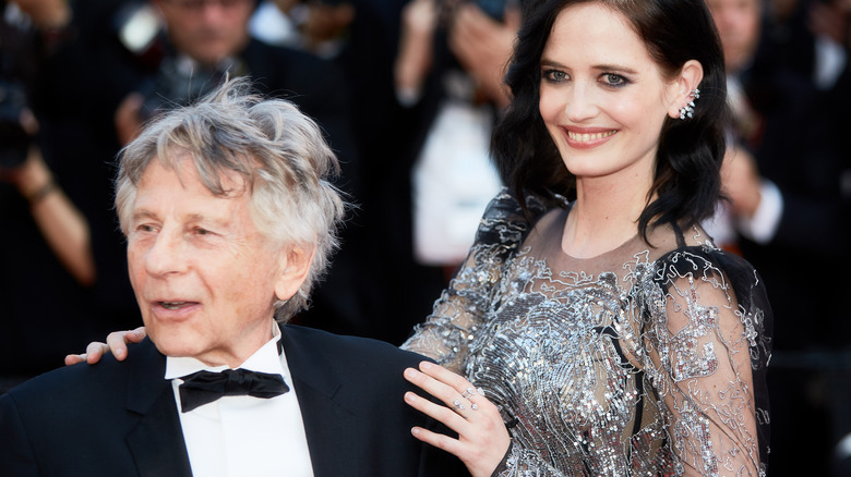 Eva Green smiling with Roman Polanski