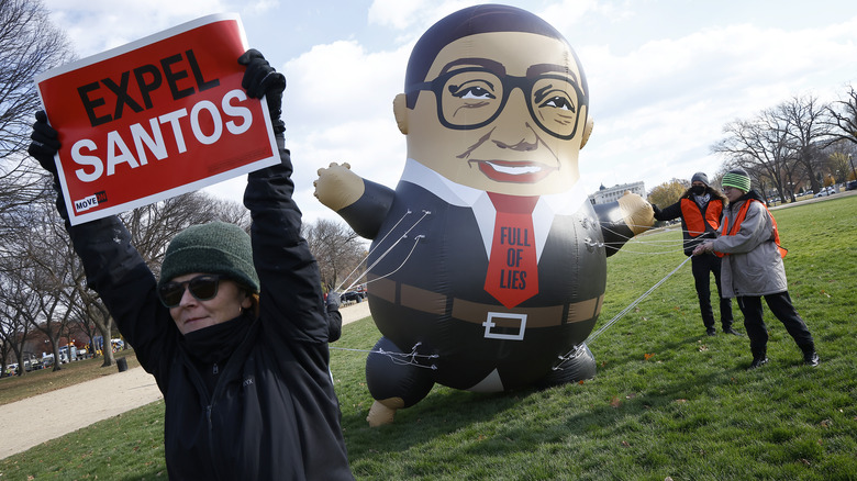 Protesters trying to expel George Santos