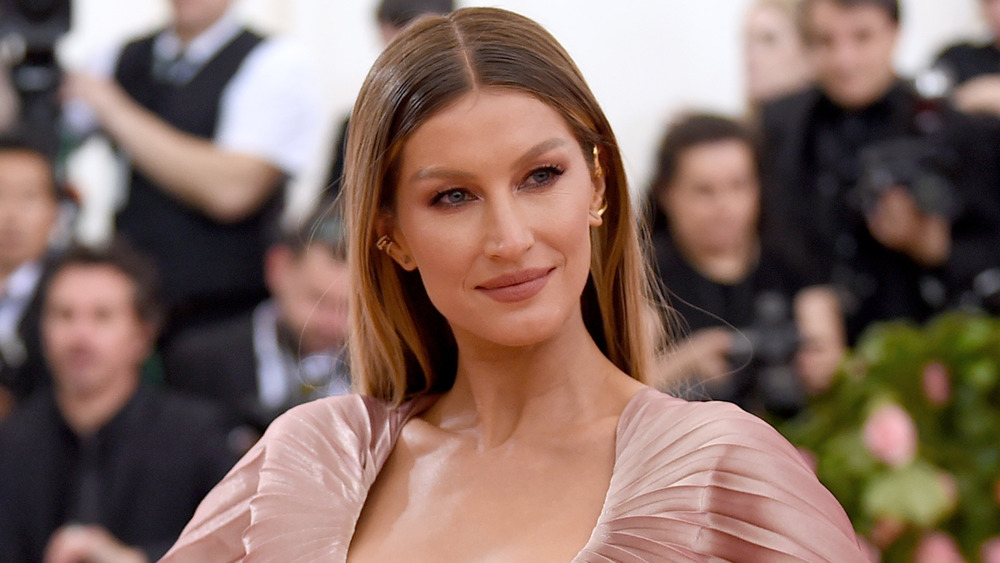 Gisele Bundchen smirking 