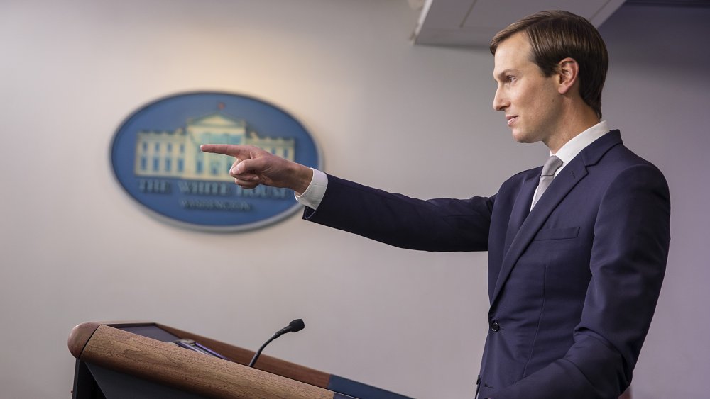 Jared Kushner pointing at reporters during a White House press conference 