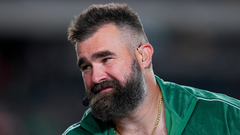 Jason Kelce spectates a game between the Atlanta Falcons and Philadelphia Eagles in tracksuit