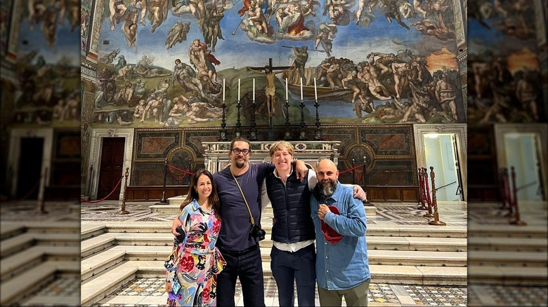 Jason Momoa takes a photo in the Sistine Chapel