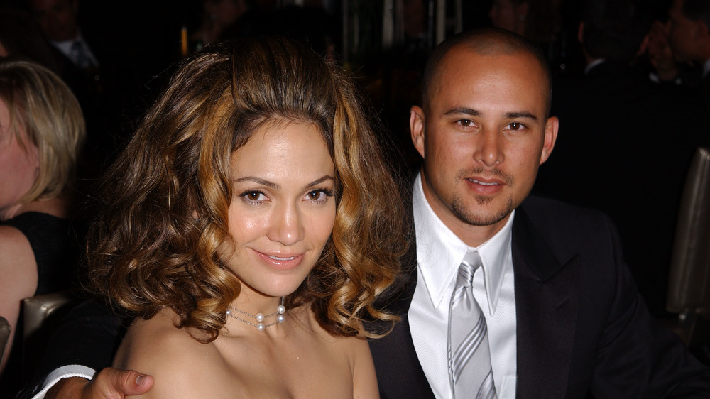 Jennifer Lopez and Cris Judd smiling 