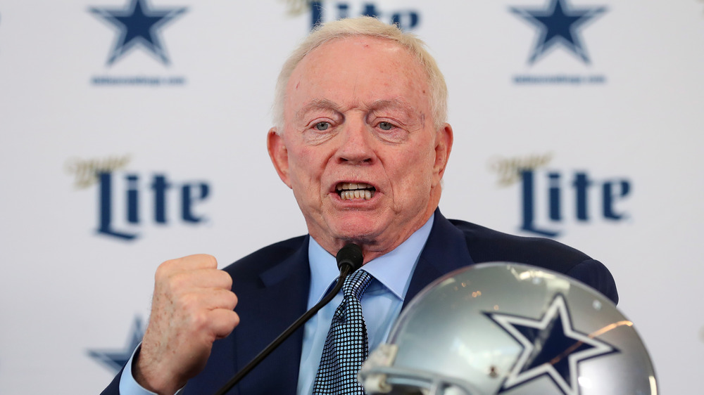 Jerry Jones looking angry, raising his fist