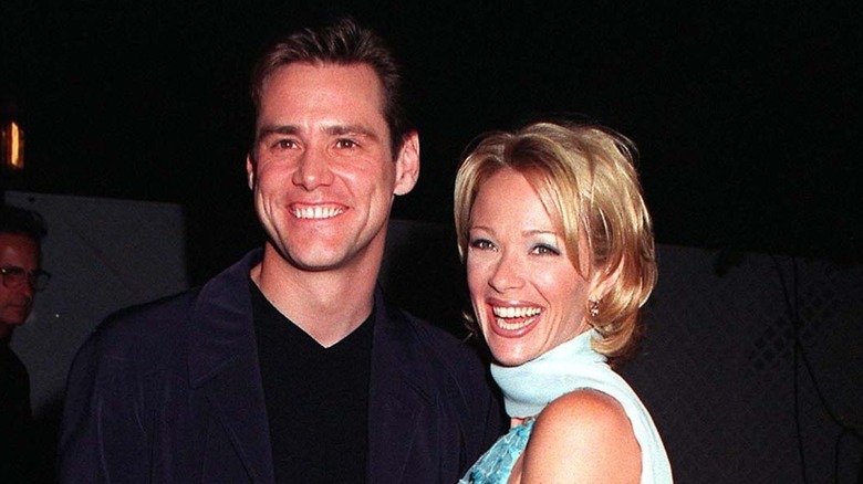 Jim Carrey and Lauren Holly smiling 