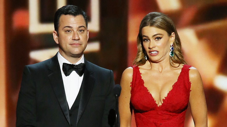 Jimmy Kimmel standing and Sofía Vergara speaking