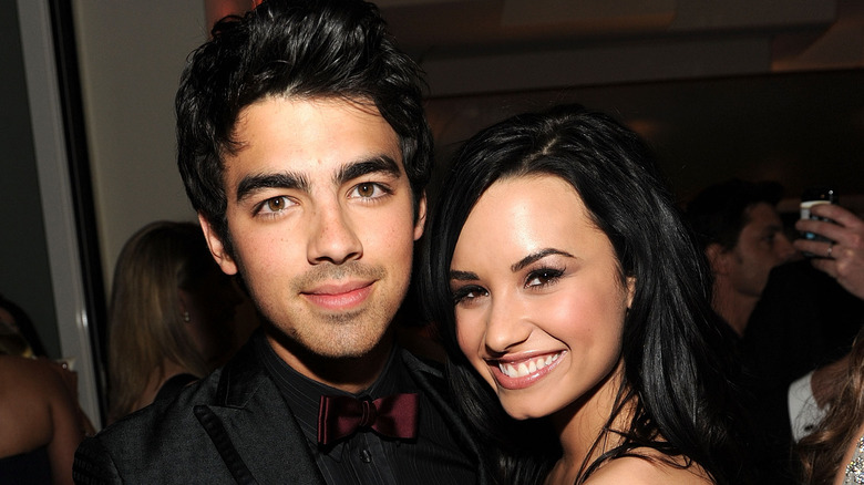 Joe Jonas poses with Demi Lovato