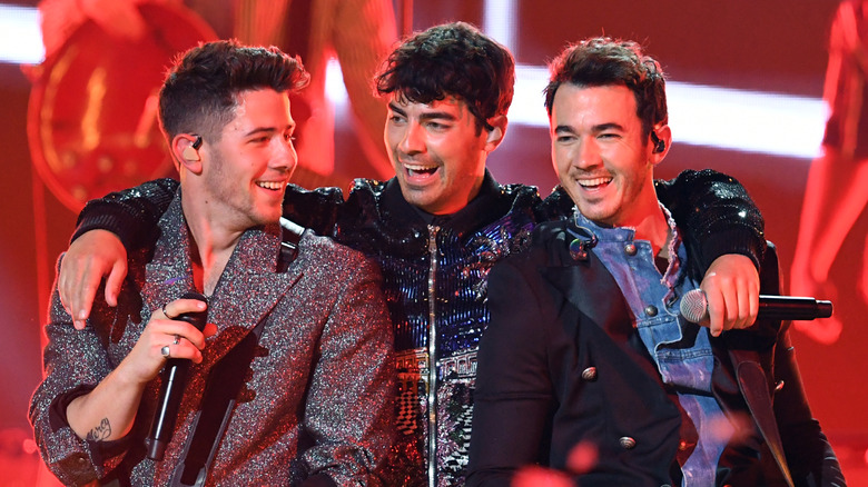 The Jonas Brothers performing together