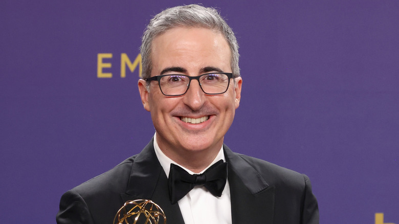 John Oliver accepts an award during the 76th Primetime Emmy Awards in Los Angeles, CA (2024)