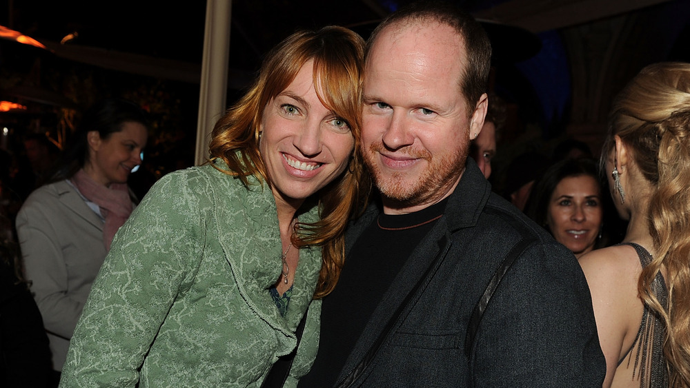 Kai Cole and Joss Whedon smiling