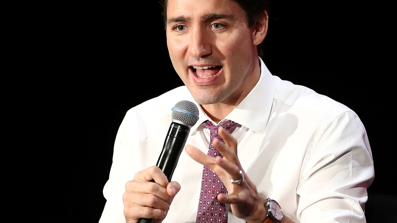 Justin Trudeau holding a mic