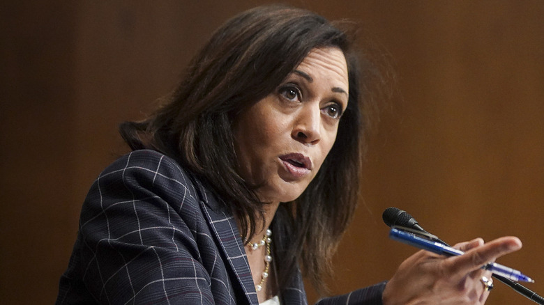 Kamala Harris looking serious and pointing