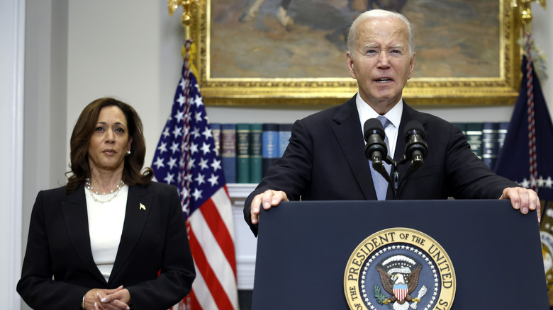 Kamala Harris and Joe Biden speaking at a podium