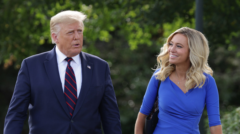 Donald Trump and Kayleigh McEnany walking