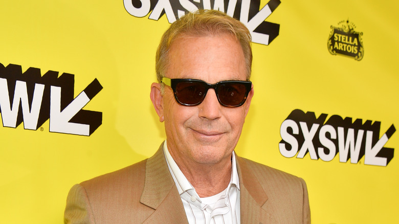 Kevin Costner smiling sunglasses