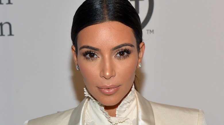 Kim Kardashian in diamond earrings
