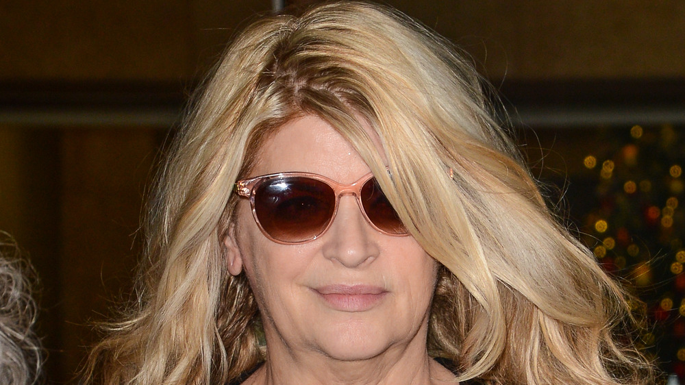 Kirstie Alley wearing sunglasses