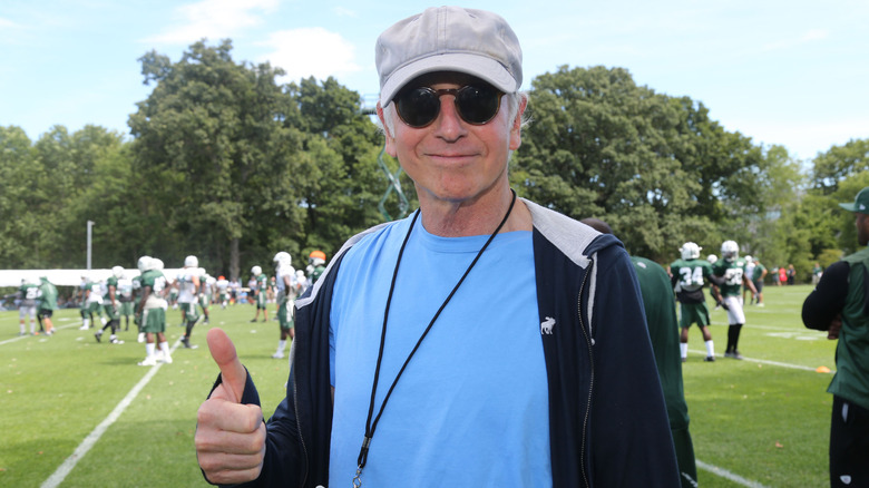 Larry David thumbs up Jets