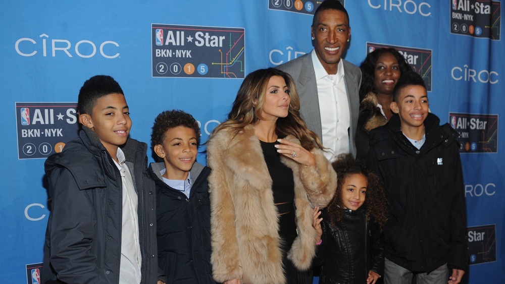 The Pippen family smiling on the red carpet 