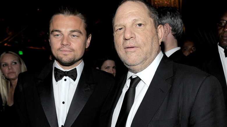 Leonardo DiCaprio and Harvey Weinstein posing 