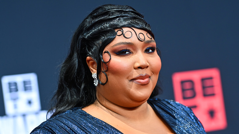 Lizzo poses for a photo