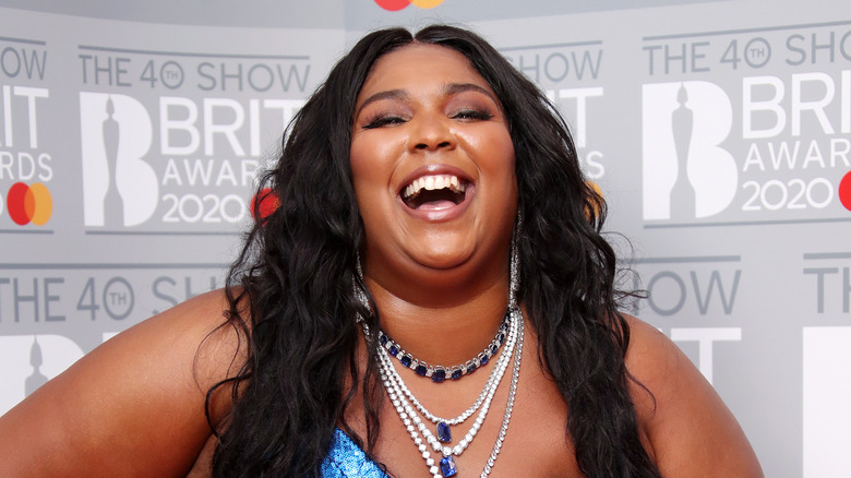 Lizzo poses for a photo