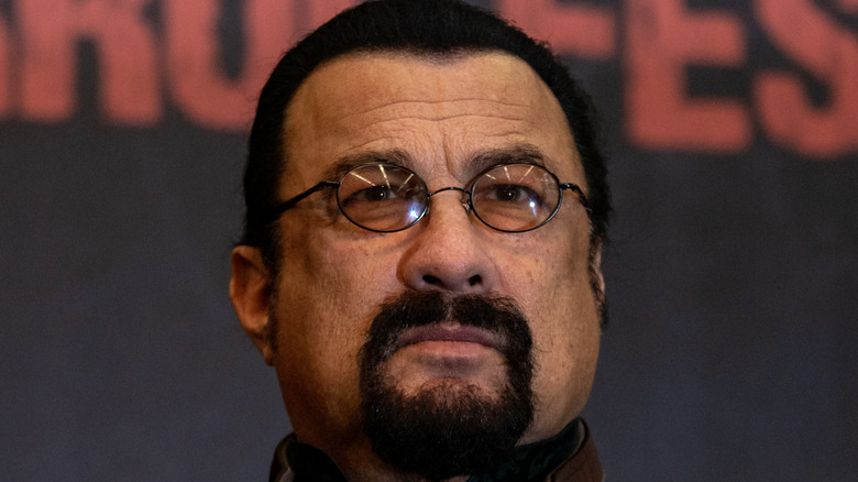 Steven Seagal posing for cameras