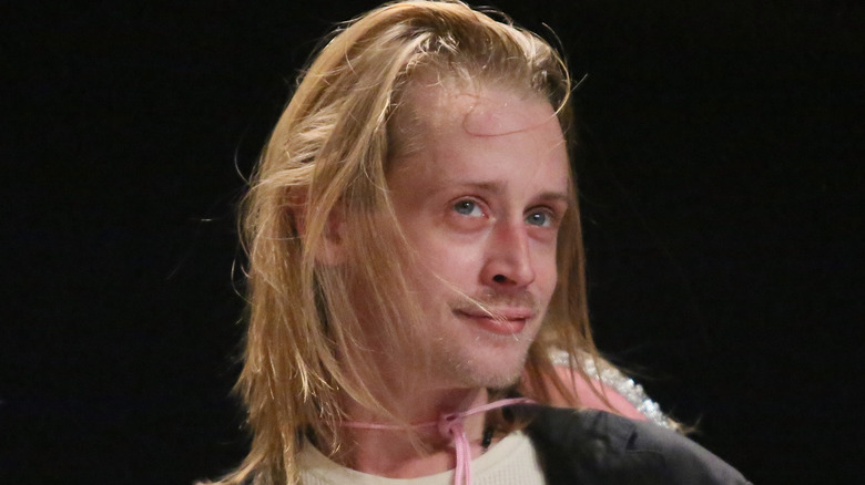 Macaulay Culkin with long hair