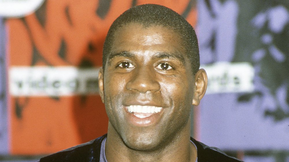 Young Magic Johnson smiling