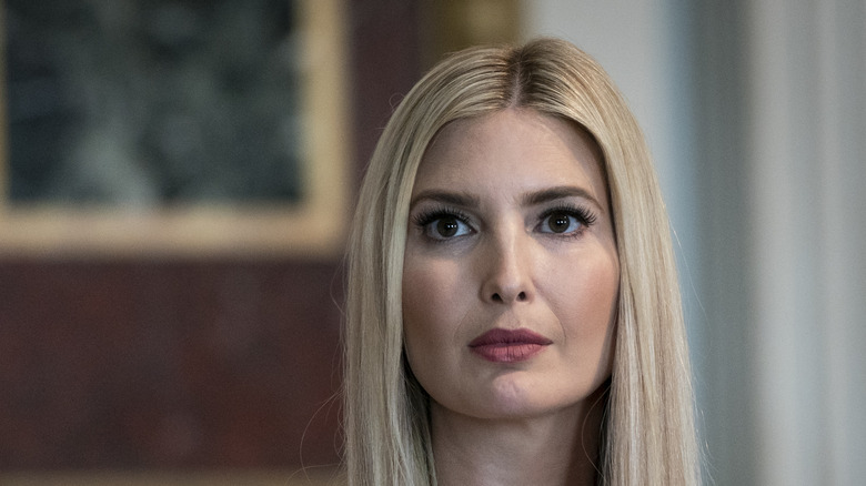 Ivanka Trump red lipstick staring