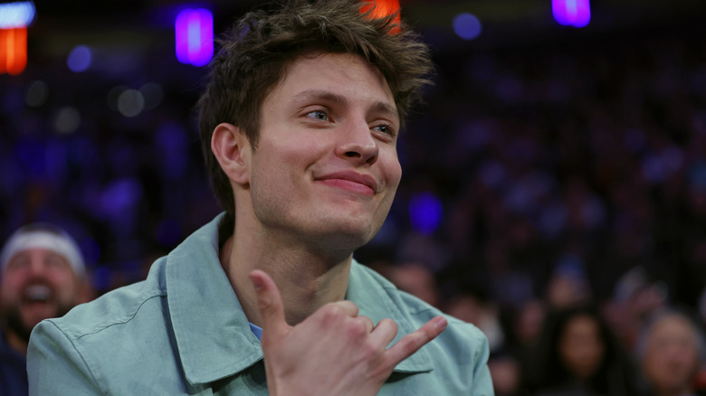 Matt Rife making Shaka hand sign