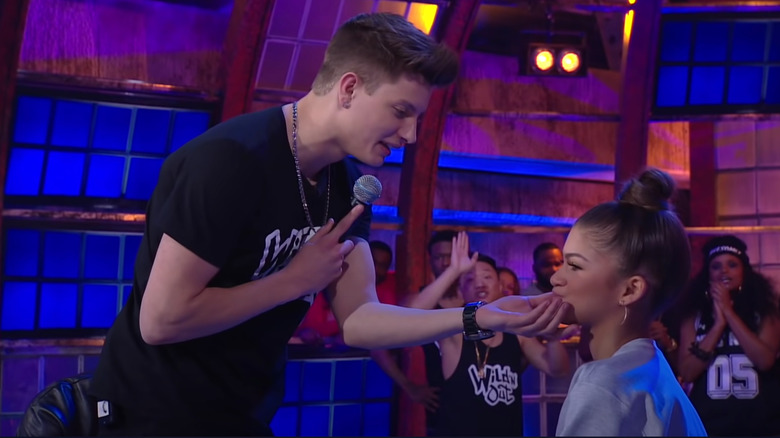 Matt Rife touching Zendaya's face