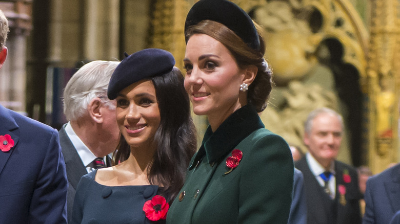 Kate Middleton and Meghan Markle smiling