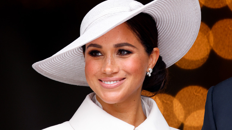 Meghan Markle, smiling