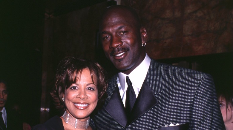 Michael Jordan and Juanita Vanoy stand together smiling