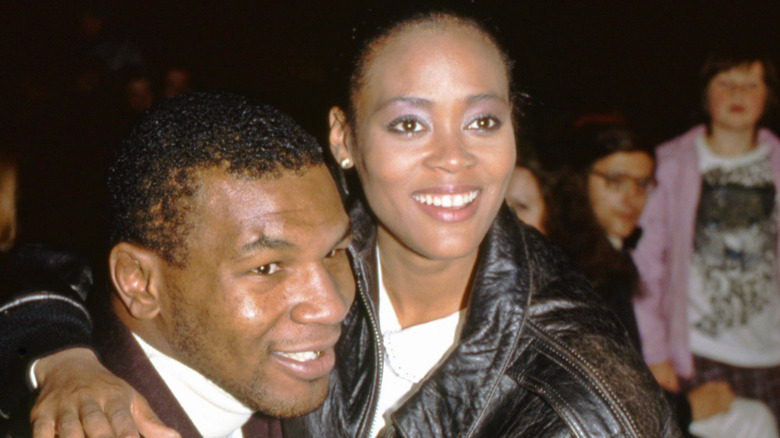 Mike Tyson, Robin Givens hugging