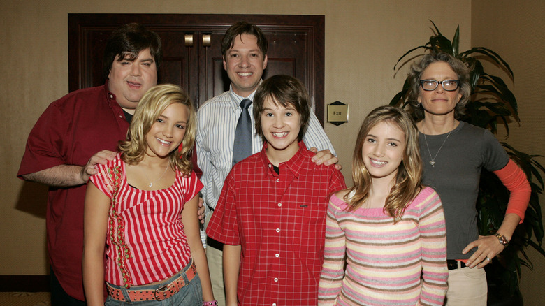 Nick Schneider poses with Nickelodeon cast members