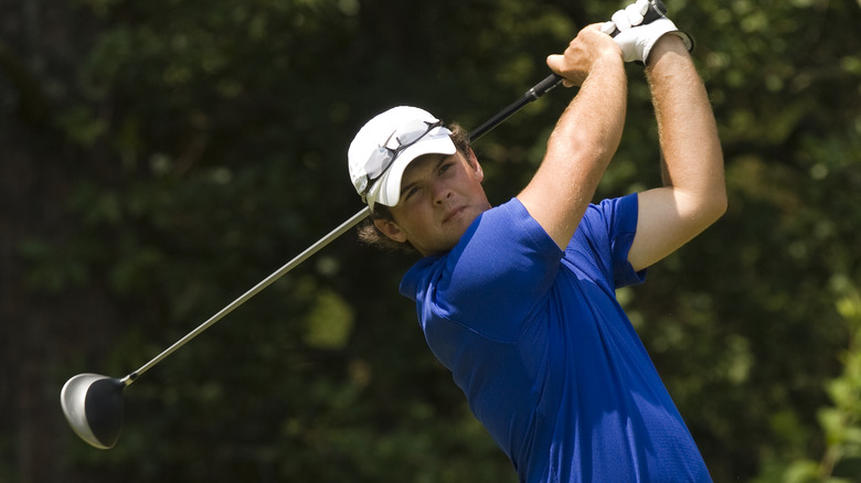 Young Patrick Reed playing golf