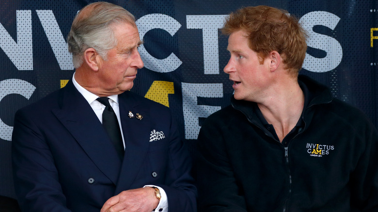 King Charles and Prince Harry talking