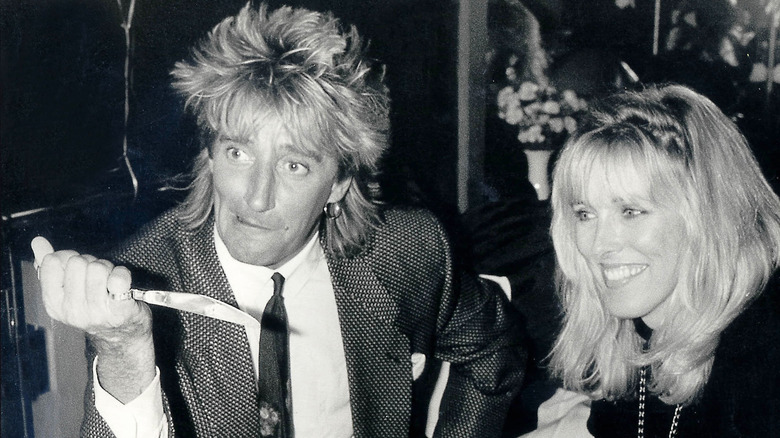 Rod Stewart holding knife