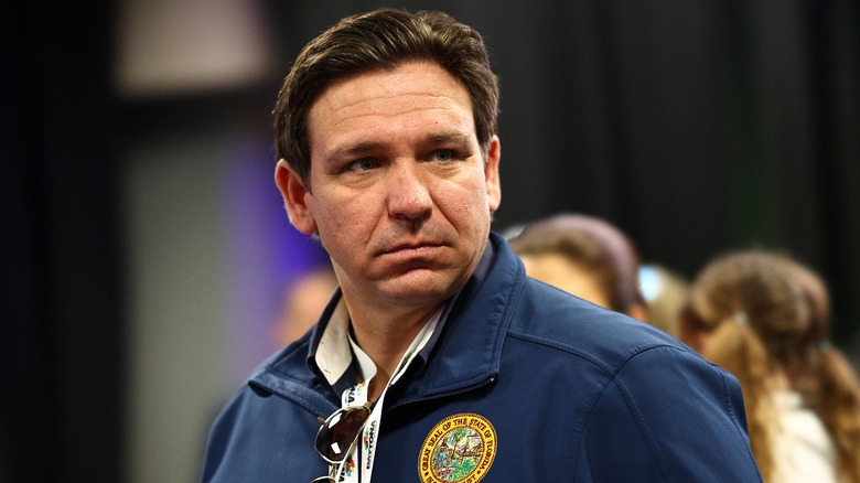 Ron DeSantis walking by camera