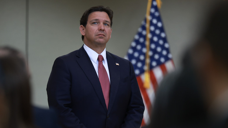 Ron DeSantis standing on stage