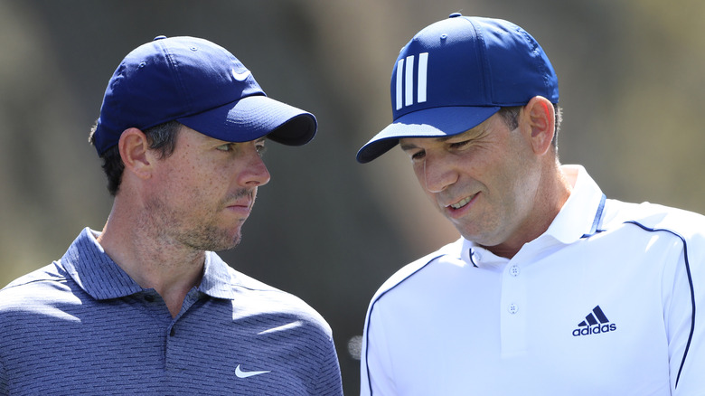 Rory McIlroy and Sergio Garcia talking