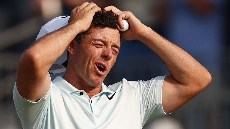 Rory McIlroy grabbing his head