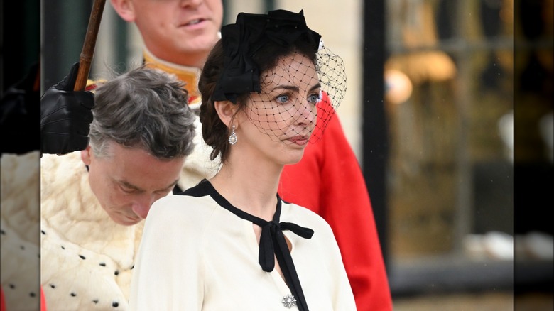 David Cholmondeley bowing and Rose Hanbury facing forward