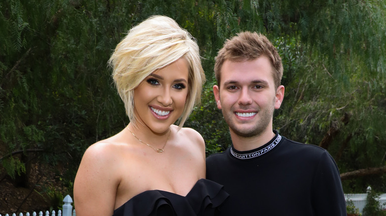 Savannah and Chase Chrisley pose together