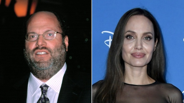 Scott Rudin grimacing and Angelina Jolie smiling