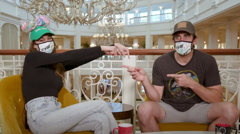 Shailene Woodley, Aaron Rodgers pointing at each other