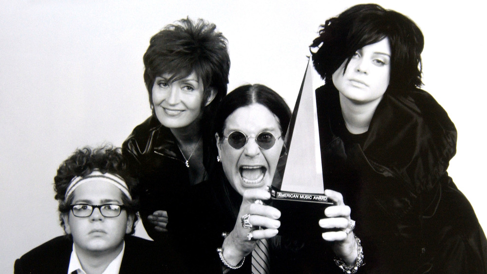 Sharon, Ozzy, Jack and Kelly Osbourne posing at the American Music Awards 